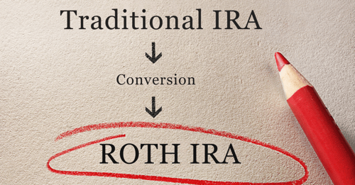 A red pencil on top of a piece of paper that shows arrows pointing from Tradtional IRA to Roth IRA to illustrate a Roth IRA conversion.